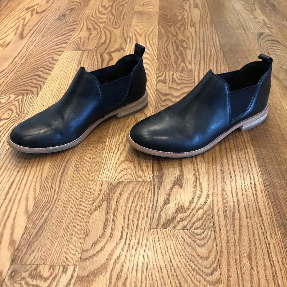Clark’s brand black leather ankle bootie